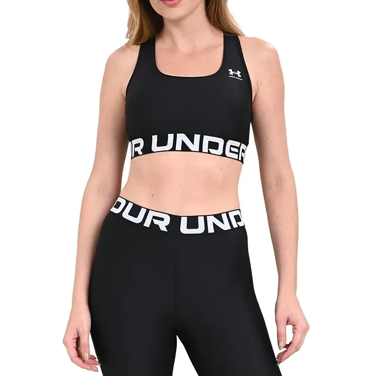 Top de treino feminino Under Armour preto e branco com design esportivo e logo em destaque